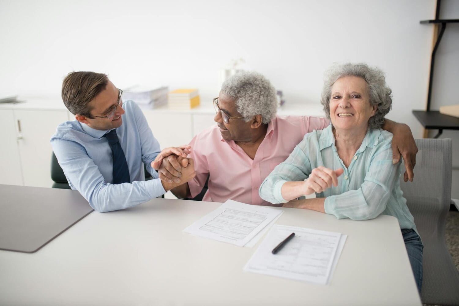 Happy couple reviewing life insurance options in Little Rock, AR