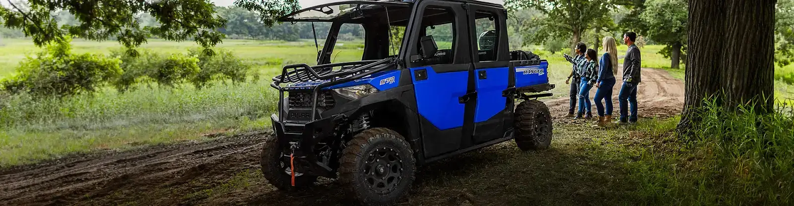 a blue and black ATV with a black roof in Arkansas