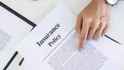 a person pointing at a life insurance policy form
