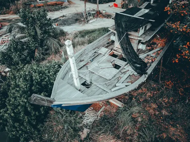 a boat on the ground damaged by the storm in Arkansas