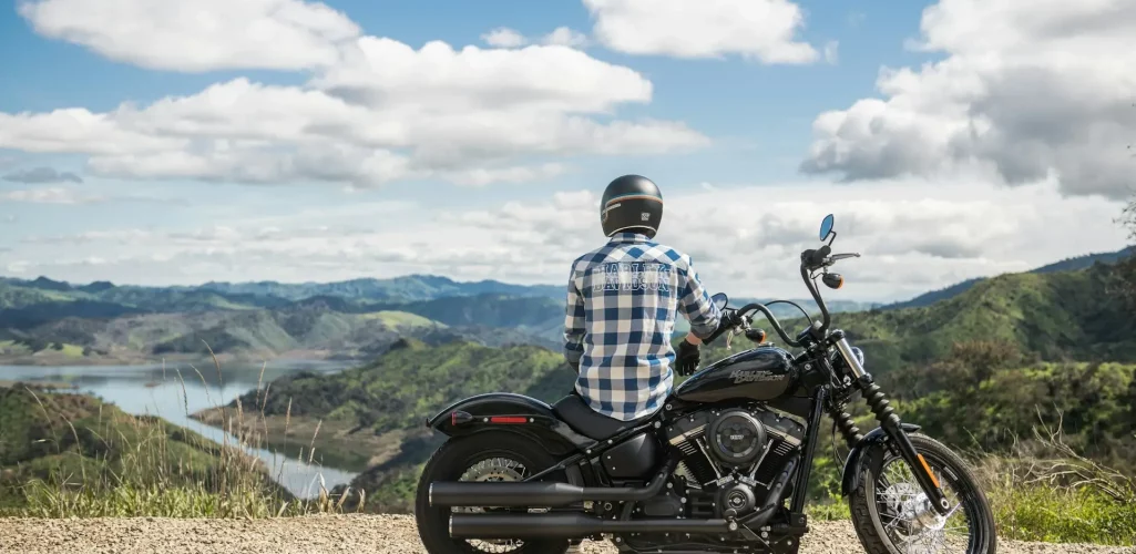 a man sitting on motorcycle