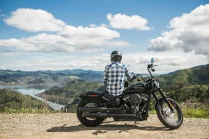 a man sitting on motorcycle